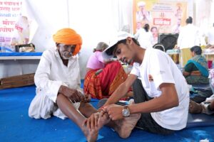 Safeguarding the health of lakhs of Warkaris through the 'Charanseva' initiative.