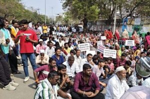 Villagers from five villages protest at the district court