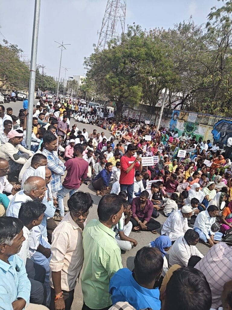 Villagers from five villages protest at the district court
